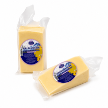 Сир ШВЕЙЦАРСЬКИЙ 50%  кг 1/2 порція Молочна Садиба